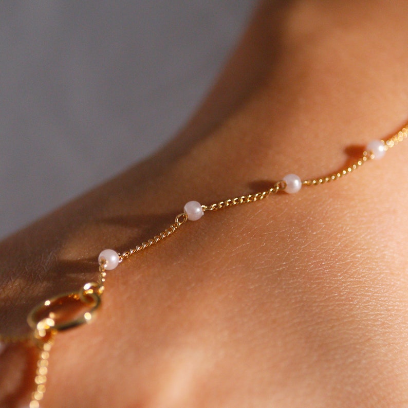Pearl Hand Chain Bracelet: Gold Link Finger Bracelet